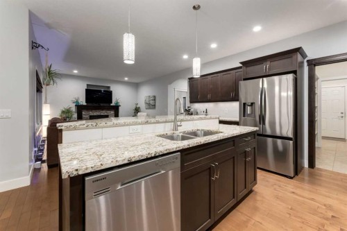 2050 High Country Rise, High River, AB - Indoor Photo Showing Kitchen With Double Sink With Upgraded Kitchen