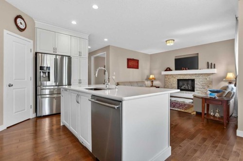 2075 Brightoncrest Common Se, Calgary, AB - Indoor Photo Showing Kitchen With Fireplace With Upgraded Kitchen