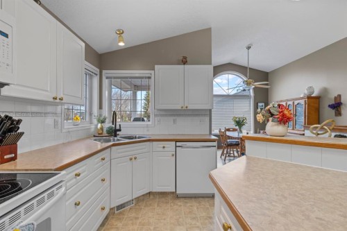 161 West Lakeview Drive, Chestermere, AB - Indoor Photo Showing Kitchen With Double Sink