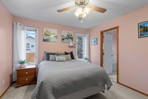 161 West Lakeview Drive, Chestermere, AB - Indoor Photo Showing Bedroom