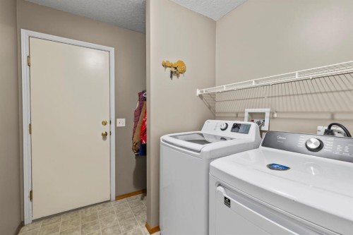 161 West Lakeview Drive, Chestermere, AB - Indoor Photo Showing Laundry Room