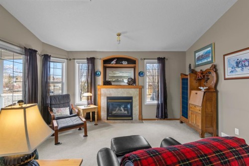 161 West Lakeview Drive, Chestermere, AB - Indoor Photo Showing Living Room With Fireplace