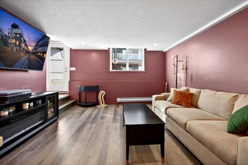 216-474 Seton Circle Se, Calgary, AB - Indoor Photo Showing Living Room