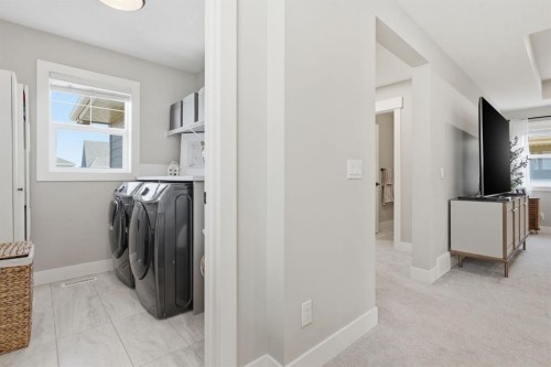 19 Masters Green Se, Calgary, AB - Indoor Photo Showing Laundry Room