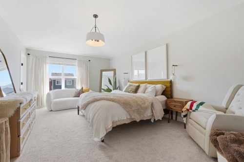 19 Masters Green Se, Calgary, AB - Indoor Photo Showing Bedroom