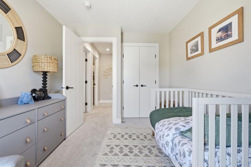 19 Masters Green Se, Calgary, AB - Indoor Photo Showing Bedroom