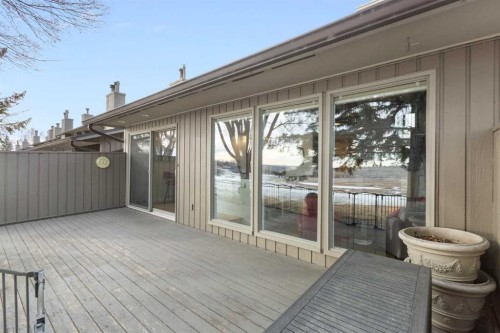 825-860 Midridge Drive Se, Calgary, AB - Outdoor With Deck Patio Veranda With Exterior