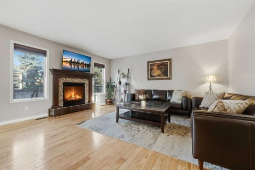 307 Valley Crest Court Nw, Calgary, AB - Indoor Photo Showing Living Room With Fireplace