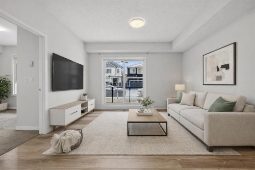 1106-33 Carringham Gate Nw, Calgary, AB - Indoor Photo Showing Living Room
