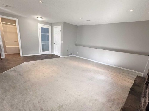 26 Copperfield View Se, Calgary, AB - Indoor Photo Showing Other Room