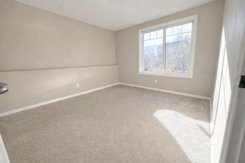 26 Copperfield View Se, Calgary, AB - Indoor Photo Showing Other Room