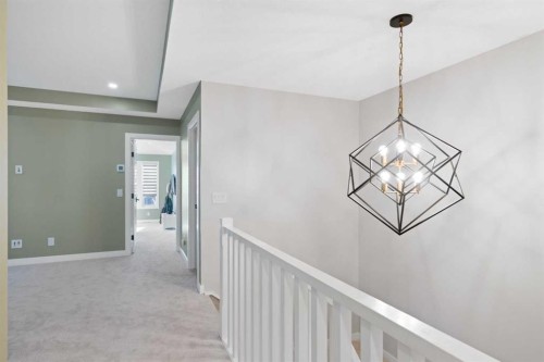 96 Emberside Glen, Cochrane, AB - Indoor Photo Showing Other Room