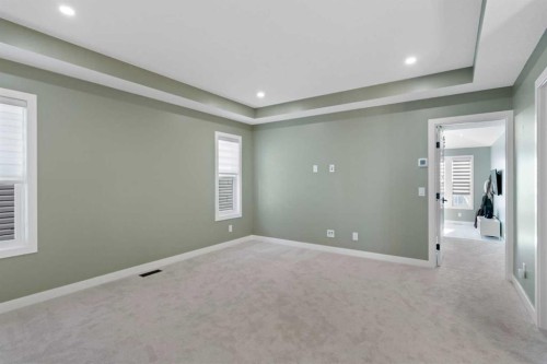 96 Emberside Glen, Cochrane, AB - Indoor Photo Showing Other Room