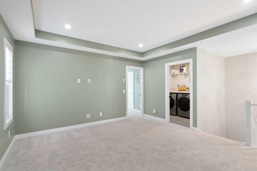 96 Emberside Glen, Cochrane, AB - Indoor Photo Showing Other Room