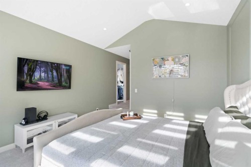 96 Emberside Glen, Cochrane, AB - Indoor Photo Showing Bedroom