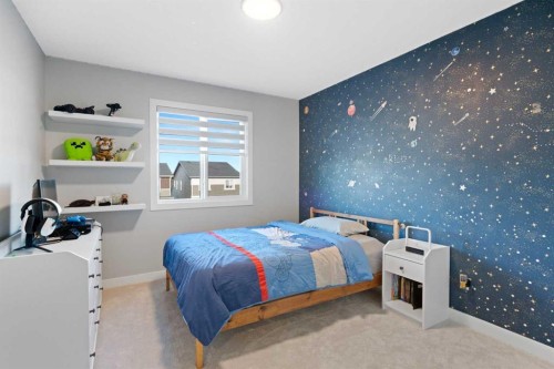 96 Emberside Glen, Cochrane, AB - Indoor Photo Showing Bedroom