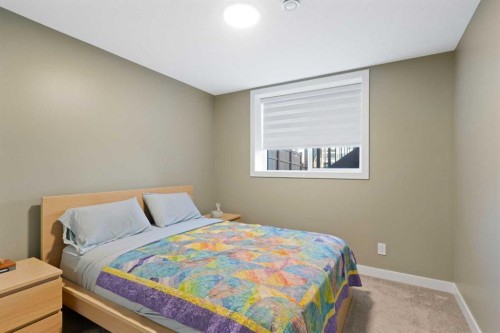 96 Emberside Glen, Cochrane, AB - Indoor Photo Showing Bedroom