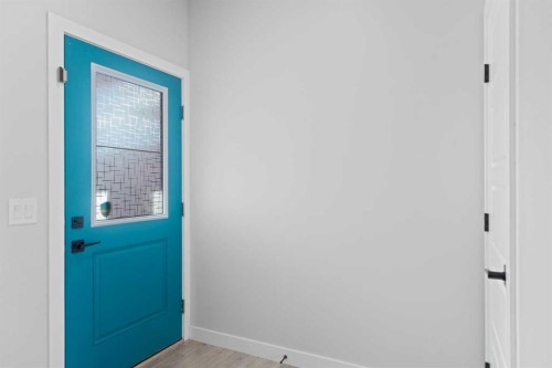 96 Emberside Glen, Cochrane, AB - Indoor Photo Showing Other Room