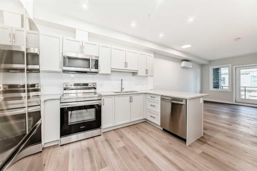 2209-2117 81 Street Sw, Calgary, AB - Indoor Photo Showing Kitchen With Stainless Steel Kitchen With Upgraded Kitchen