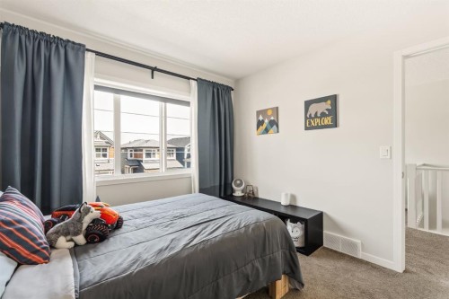 63 Seton Gardens Se, Calgary, AB - Indoor Photo Showing Bedroom