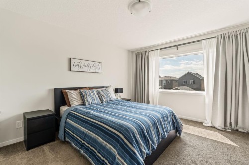 63 Seton Gardens Se, Calgary, AB - Indoor Photo Showing Bedroom
