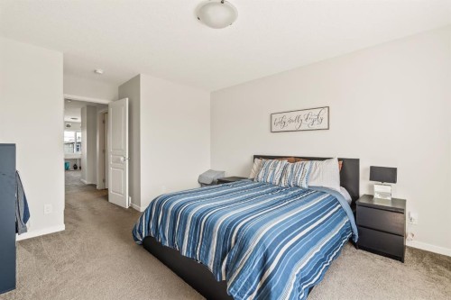 63 Seton Gardens Se, Calgary, AB - Indoor Photo Showing Bedroom
