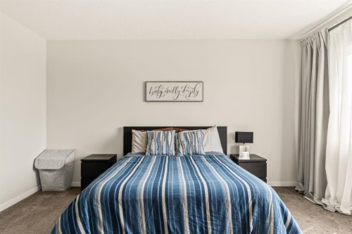 63 Seton Gardens Se, Calgary, AB - Indoor Photo Showing Bedroom