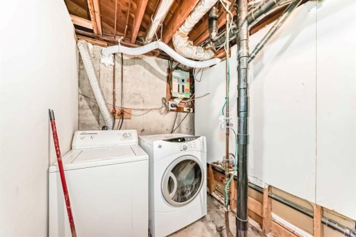 5439 Dalrymple Crescent Nw, Calgary, AB - Indoor Photo Showing Laundry Room