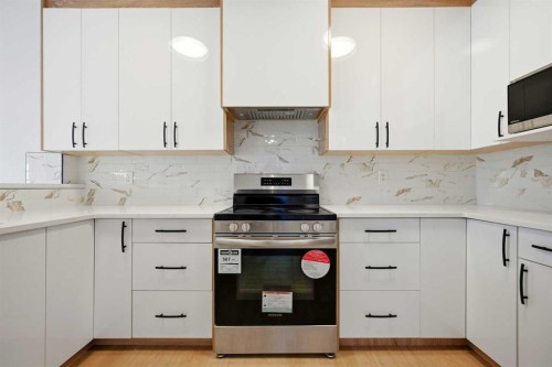 81 Saddlemont Road Ne, Calgary, AB - Indoor Photo Showing Kitchen
