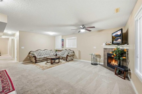 81 Saddlemont Road Ne, Calgary, AB - Indoor With Fireplace