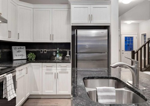 63 Panton Way Nw, Calgary, AB - Indoor Photo Showing Kitchen With Double Sink With Upgraded Kitchen