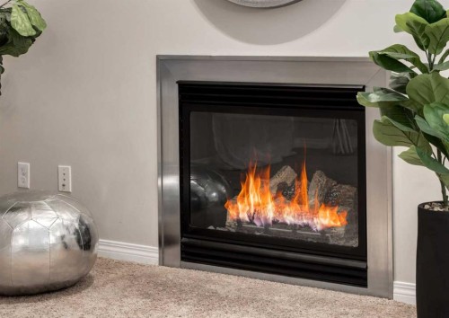 63 Panton Way Nw, Calgary, AB - Indoor With Fireplace