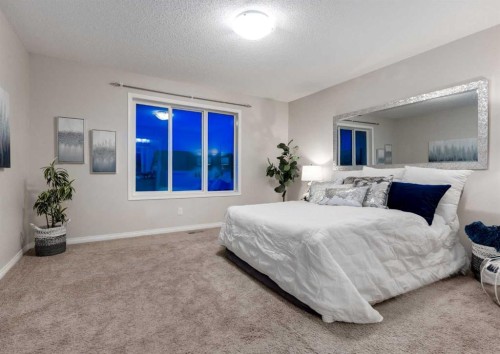 63 Panton Way Nw, Calgary, AB - Indoor Photo Showing Bedroom