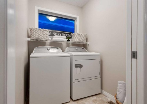 63 Panton Way Nw, Calgary, AB - Indoor Photo Showing Laundry Room