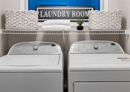 63 Panton Way Nw, Calgary, AB - Indoor Photo Showing Laundry Room