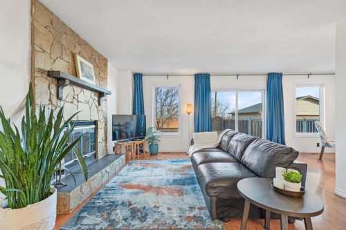 164 Beddington Circle Ne, Calgary, AB - Indoor Photo Showing Living Room With Fireplace
