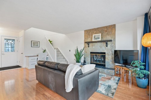 164 Beddington Circle Ne, Calgary, AB - Indoor Photo Showing Living Room With Fireplace
