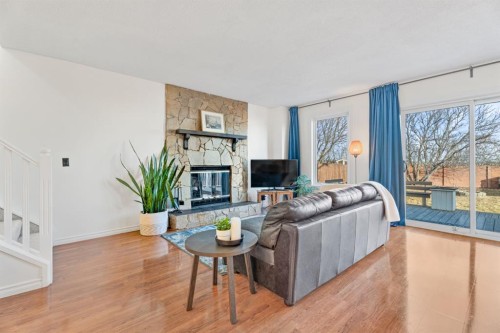 164 Beddington Circle Ne, Calgary, AB - Indoor Photo Showing Living Room With Fireplace