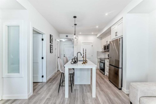105-30 Sage Hill Walk Nw, Calgary, AB - Indoor Photo Showing Kitchen With Stainless Steel Kitchen With Upgraded Kitchen