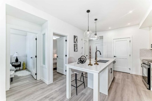 105-30 Sage Hill Walk Nw, Calgary, AB - Indoor Photo Showing Kitchen With Upgraded Kitchen
