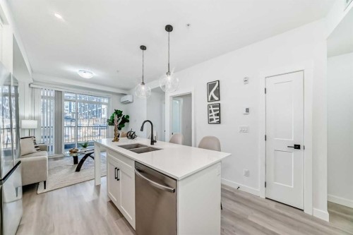 105-30 Sage Hill Walk Nw, Calgary, AB - Indoor Photo Showing Kitchen With Double Sink With Upgraded Kitchen