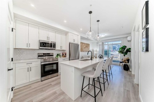 105-30 Sage Hill Walk Nw, Calgary, AB - Indoor Photo Showing Kitchen With Stainless Steel Kitchen With Upgraded Kitchen