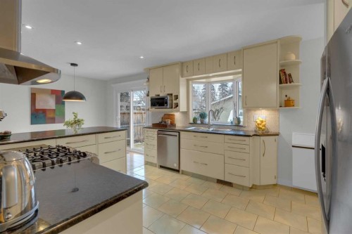 4512 41 Avenue Sw, Calgary, AB - Indoor Photo Showing Kitchen With Stainless Steel Kitchen