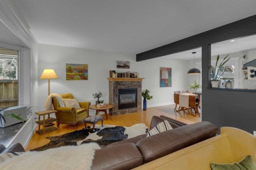 4512 41 Avenue Sw, Calgary, AB - Indoor Photo Showing Living Room With Fireplace