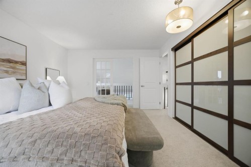 3 Stranraer Place Sw, Calgary, AB - Indoor Photo Showing Bedroom