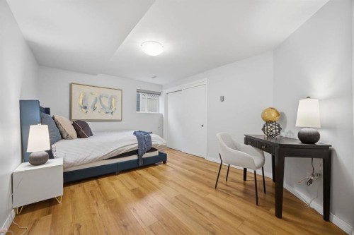3 Stranraer Place Sw, Calgary, AB - Indoor Photo Showing Bedroom