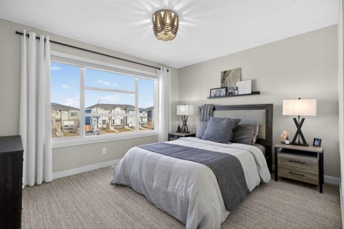 35 Wolf Hollow Park Se, Calgary, AB - Indoor Photo Showing Bedroom