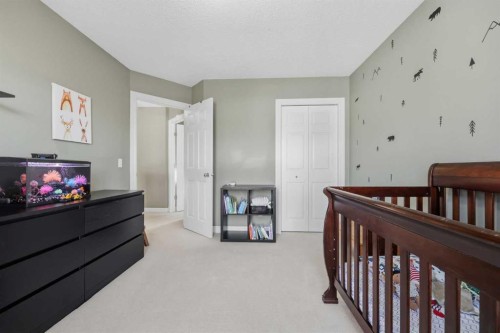 291 Springmere Link Sw, Chestermere, AB - Indoor Photo Showing Bedroom