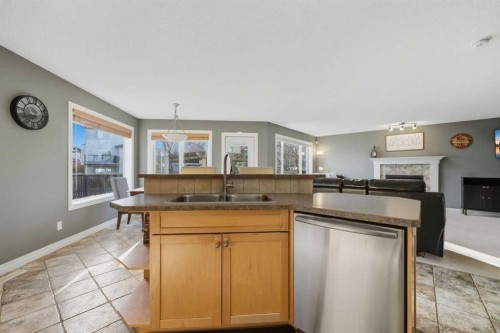 291 Springmere Link Sw, Chestermere, AB - Indoor Photo Showing Kitchen With Double Sink