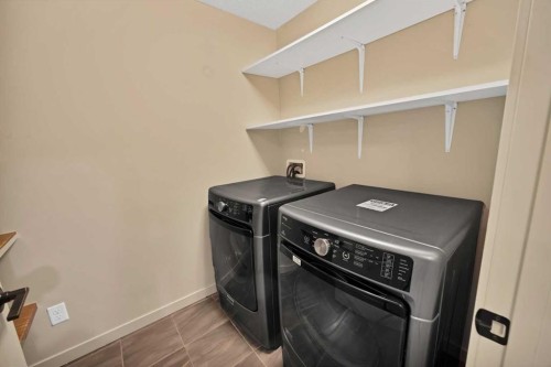 41 Red Embers Row Ne, Calgary, AB - Indoor Photo Showing Laundry Room